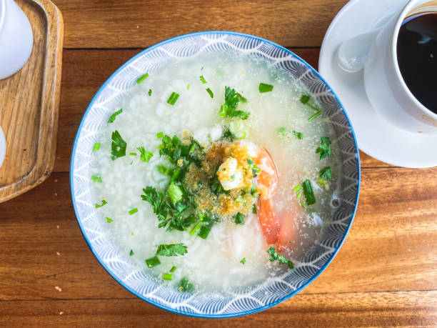 istock Porridge rice with shrimp in white bowl. top view 1495755872