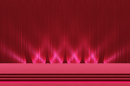 Performance stage red carpet red velvet curtain. The spotlight shines with elegance and luxury. Organize celebrations, stage theaters, concert stages, and classical orchestras. 3D illustration.