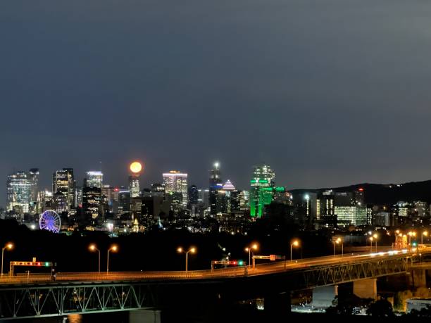 istock Low full moon over Montreal city. 1495758626