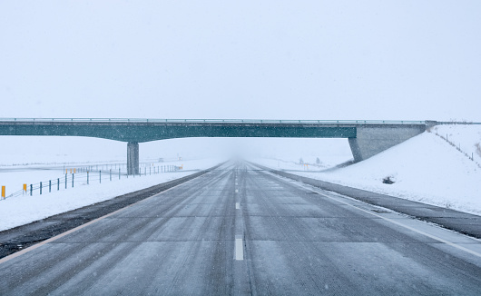 A highway in North Dakota during a snowstorm
