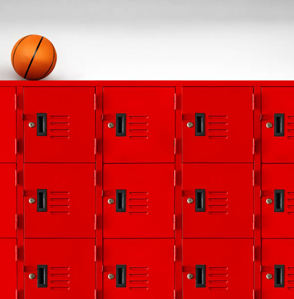 istock Basketball on red locker in gym room 1495773463