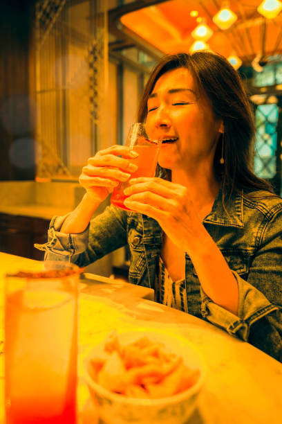 istock A woman enjoying a great cocktail 1495778168