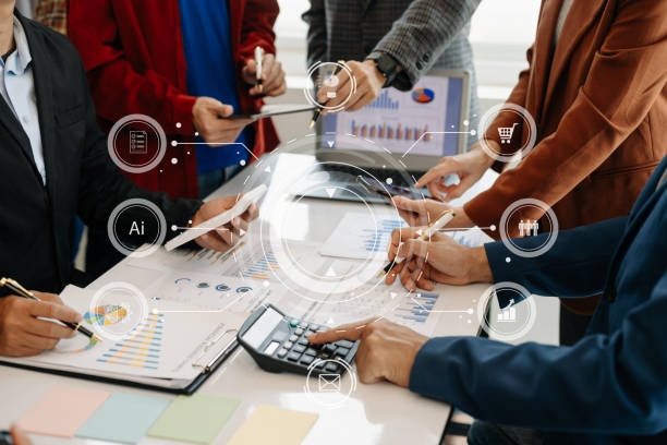 istock Working team meeting concept, business using laptop and smart phone and digital tablet computer with digital marketing media  in virtual icon network diagram office 1495785852
