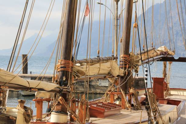 istock Majestic tall sailing ship departing from a dock, with ropes billowing in the wind 1495789087