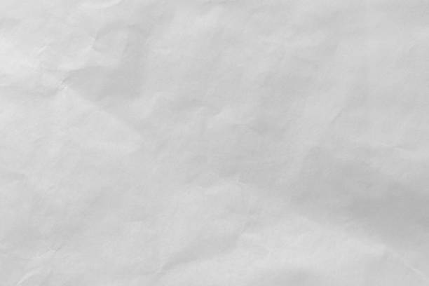 istock White color eco recycled kraft paper sheet texture cardboard background. 1495790468