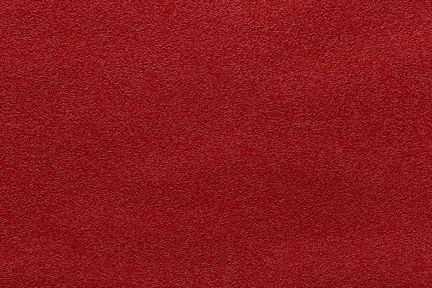 pelle rossa e uno sfondo strutturato. - car leather hide seat foto e immagini stock