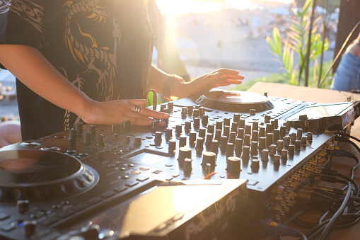DJ performing during sunset in Canggu, Bali