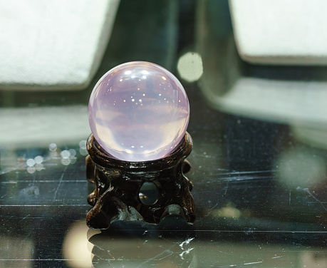 purple crystal ball on table