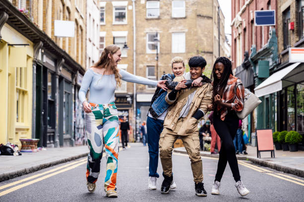 istock Playful young Londoners walking on Brick Lane 1495811468