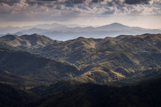 istock Mountains range view point with dramatic cumulonimbus cloud and sunlight (Kanchanaburi province, Thailand). amazing natural landscape. popular attractions best famous tourist attractions 1495822315
