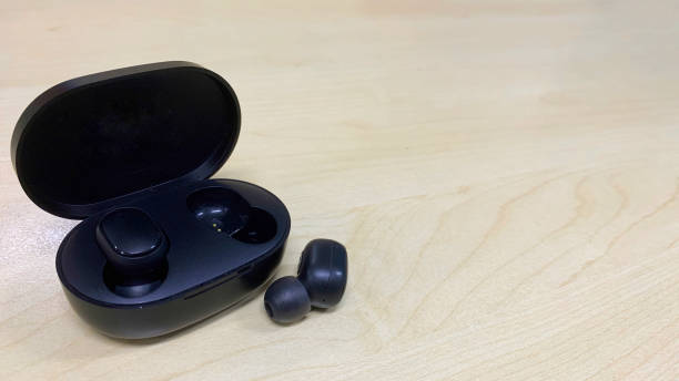 istock Earbuds on the table wood 1495827184