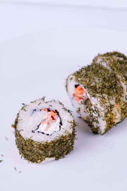 istock Cream cheese sushi with dill on the outside. 1495827245