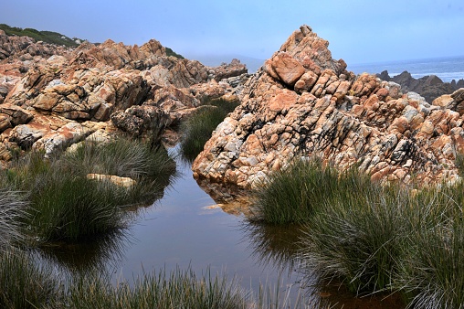closeup of beautiful rocks in water pools