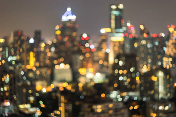 istock Illuminated night modern city lights bokeh 1495829239