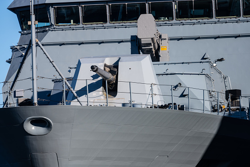 Gothenburg, Sweden - March 05 2023: 127 mm Otobreda naval gun on the deck of German naval frigate F222 Baden-W³rttemberg.