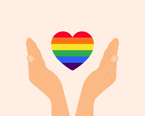 Hands With Rainbow Colored Heart. Pride Month, LGBTQ Rights And Gender Equality Concept