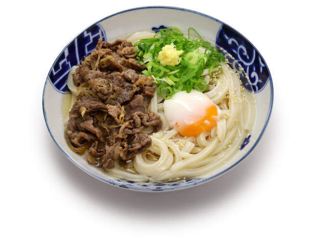 istock Sanuki udon with beef and soft-boiled egg, Japanese noodle dish 1495832605