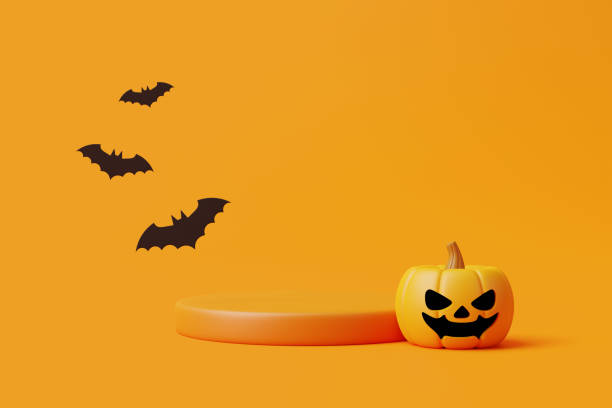 istock Jack-o-Lantern pumpkin with podium for product display and bats on orange background 1495832938