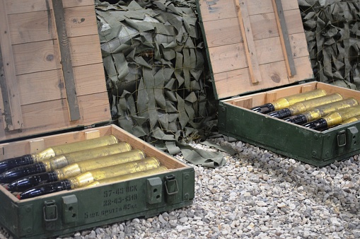 Large-caliber shells of an artillery shot in boxes