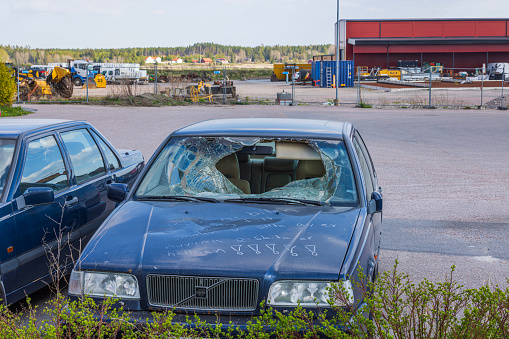Sweden. Uppsala. 06.04.2023. Close-up view of damaged Volvo car on outdoor parking place.