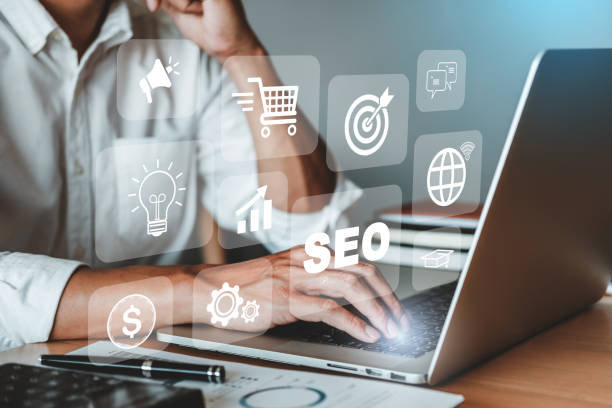 istock Businessman using a Smathphone for analysis SEO Search Engine Optimization Marketing Ranking Traffic Internet connection online for find information  Business Technology Concept. 1495859377