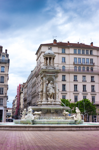 Lyon, France:  The fountain in Place des Jacobins, a 16th century square in the Presqu’ile district within the UNESCO World Heritage zone.