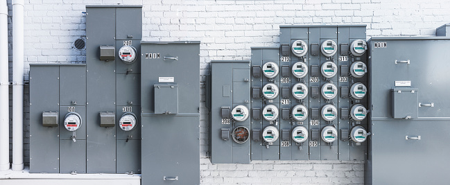 Brick wall electric meters: solution for a city's power supply that is both cost-effective and practical for Newport News, VA