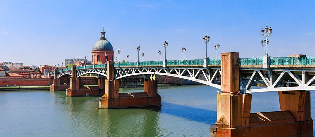 Toulouse city, France. Cityscape with Garonne river and La Grave dome