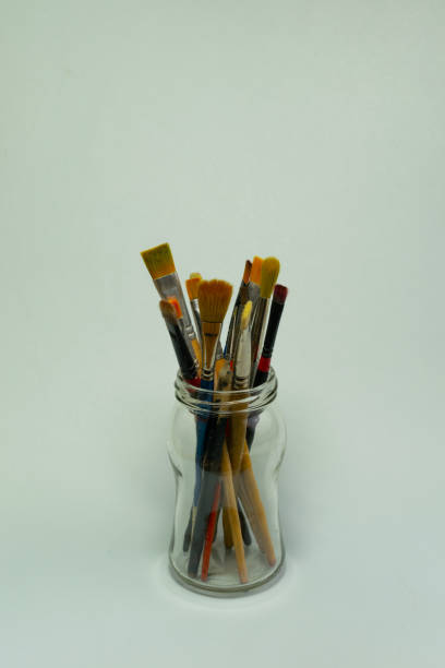 istock Art brushes in a glass jar 1495872309
