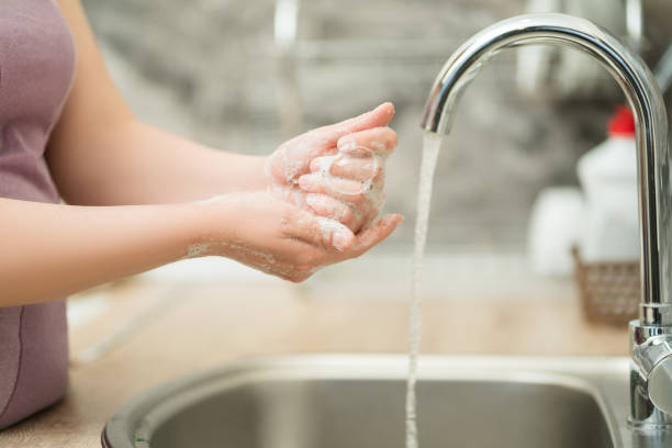 istock Washing hands with soap, hygiene concept 1495874642