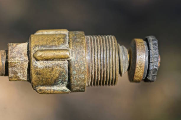 istock part of one old brown copper tube with thread 1495874809