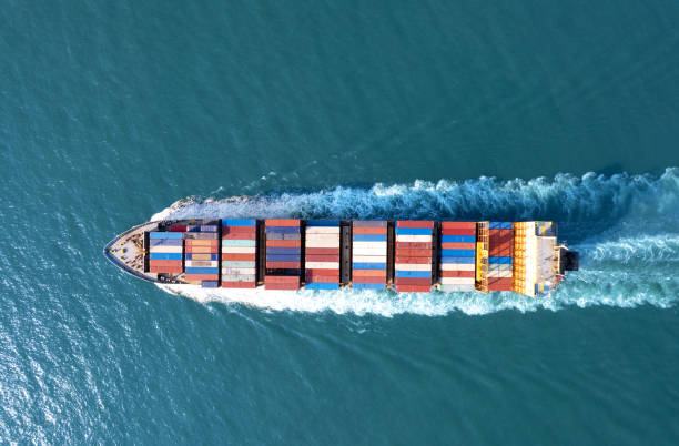 istock Top viewContainer ship loading and unloading in sea port, Aerial view of business logistic import and export freight transportation by container ship in harbor, Container loading Cargo freight ship, Dubai 1495880747