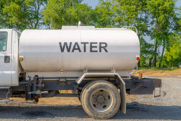 Water truck on the construction site to address blowing dust.