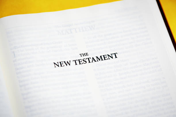 istock Bible open to the New Testament title page 1495881461