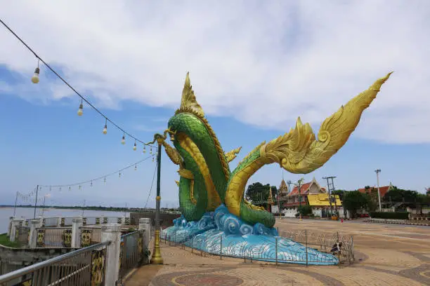 Naga statue in the park along Mekong riverside in Nong Khai, Thailand.