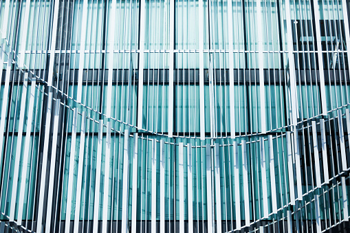 Modern office windows with clouds reflections