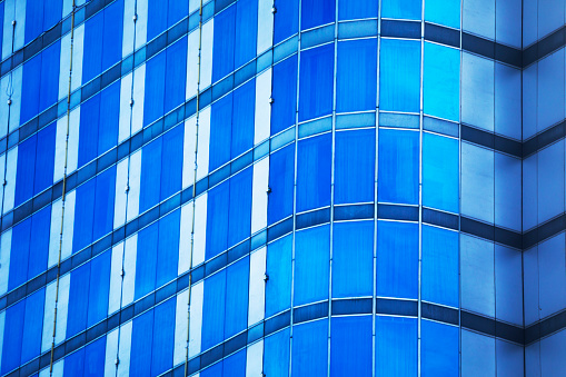 Closeup modern office building, abstract background with copy space, full frame horizontal composition