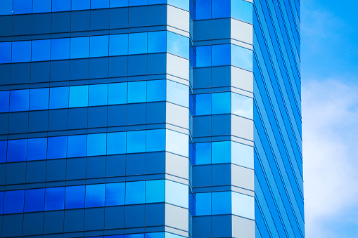 Detail of blue facade of office building in Bangkok Sutthisan  at Ratchadaphisek Rd