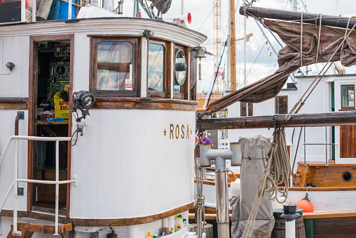 Oslo, Norway - July 19 2014: Wheel house of old wooden fishing boat Rosa.