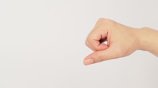 Doh hand sign (pitch) or the firm tone on white background .The sign of tone in key