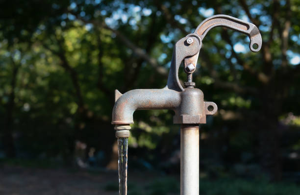 istock Drinking water tab in park on a sunny day, no person. 1495890816