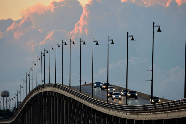 istock Barron Collier Bridge and Gilchrist Bridge in Florida with moving traffic. Transportation infrastructure in Charlotte County connecting Punta Gorda and Port Charlotte over Peace River 1495893543