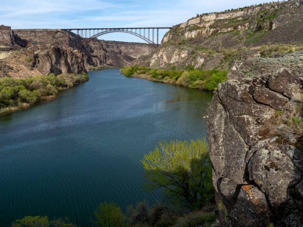 istock Shoreline rock along the Snake River a bridge spanning the river 1495894080