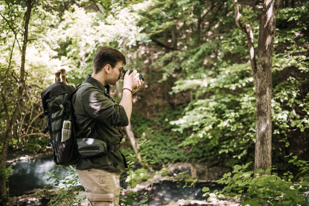istock Male hiker photographing 1495895057