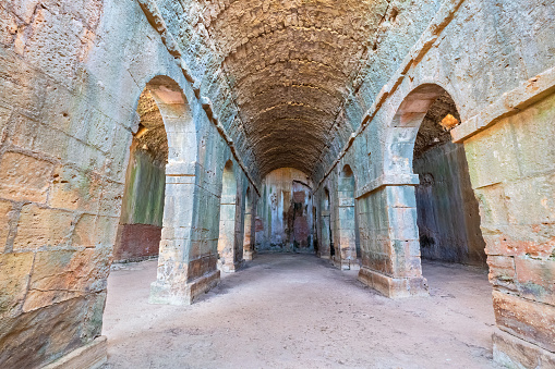 Inside view to ancient Roman cistern at archaeological site of Minoan ruins in Aptera. Crete, Greece