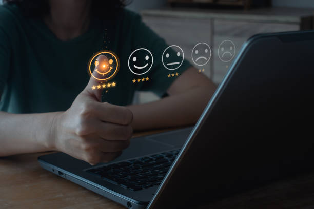 istock Customer review satisfaction feedback survey concept, woman using laptop computer with customer service and five stars satisfaction rating on the online web application. concept on a virtual screen. 1495904007