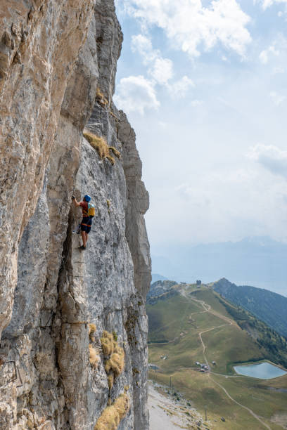 istock Man on Via Ferrata climbing up, summer activities concept 1495905176