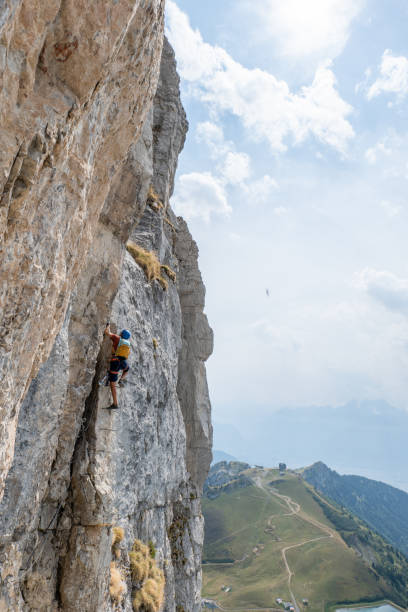 istock Man on Via Ferrata climbing up, summer activities concept 1495905179