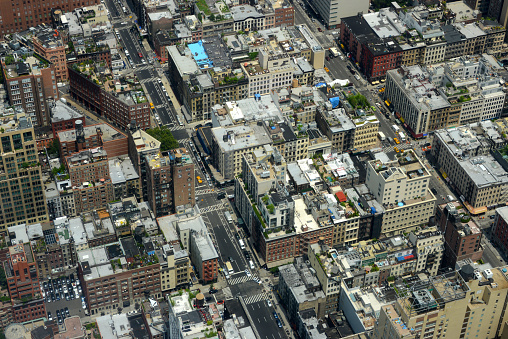 aerial view on busy residential district in Manhattan with roads and traffic