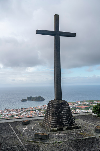 The cross of Marian sanctuary Nossa Senhora da Paz, Our Lady Of Peace Chape,view to the sea and Villa franca do campo, Sao Miguel, Azores